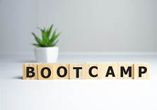 BOOTCAMP word written on wood block, business concept.